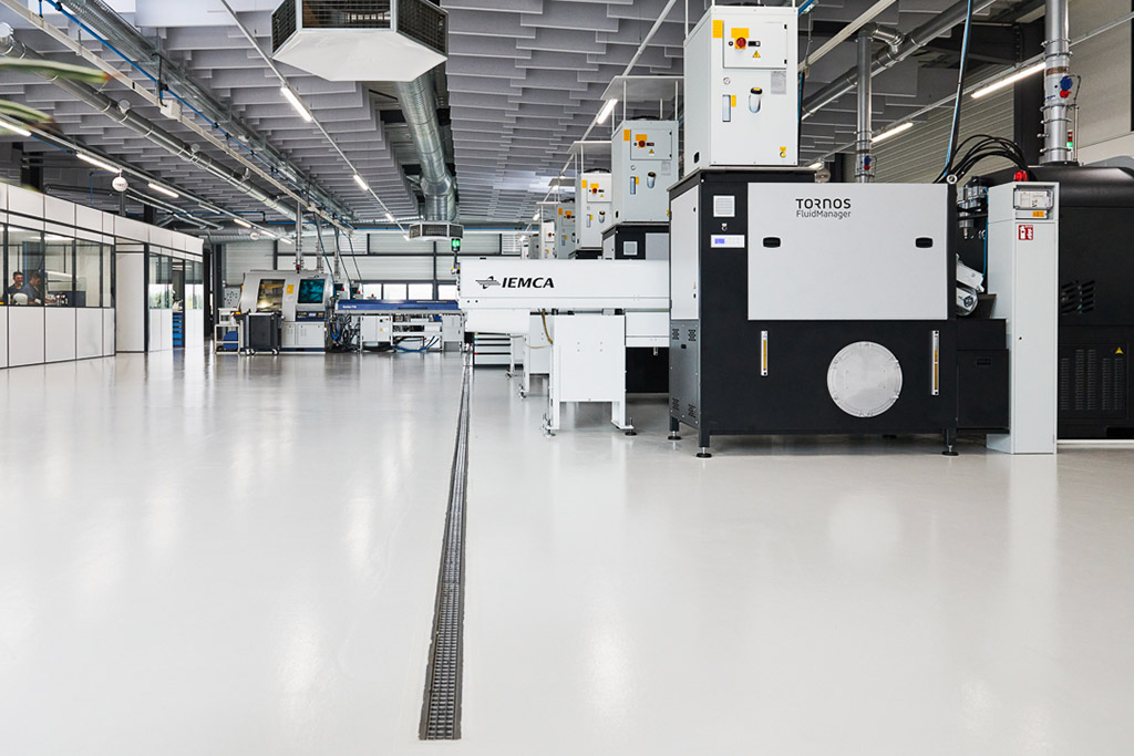 Conception d’un atelier de micro-mécanique de haute précision – Gestion de l’huile de coupe VCN salle des machines et entrepôt